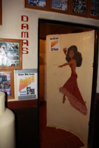 it costs 5 pesos to use the women's bathroom, if you're not a customer.  No charge for non-customers in the men's room 