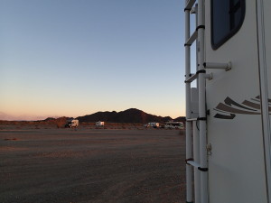 a few RVs, seen from the back of the pickup camper